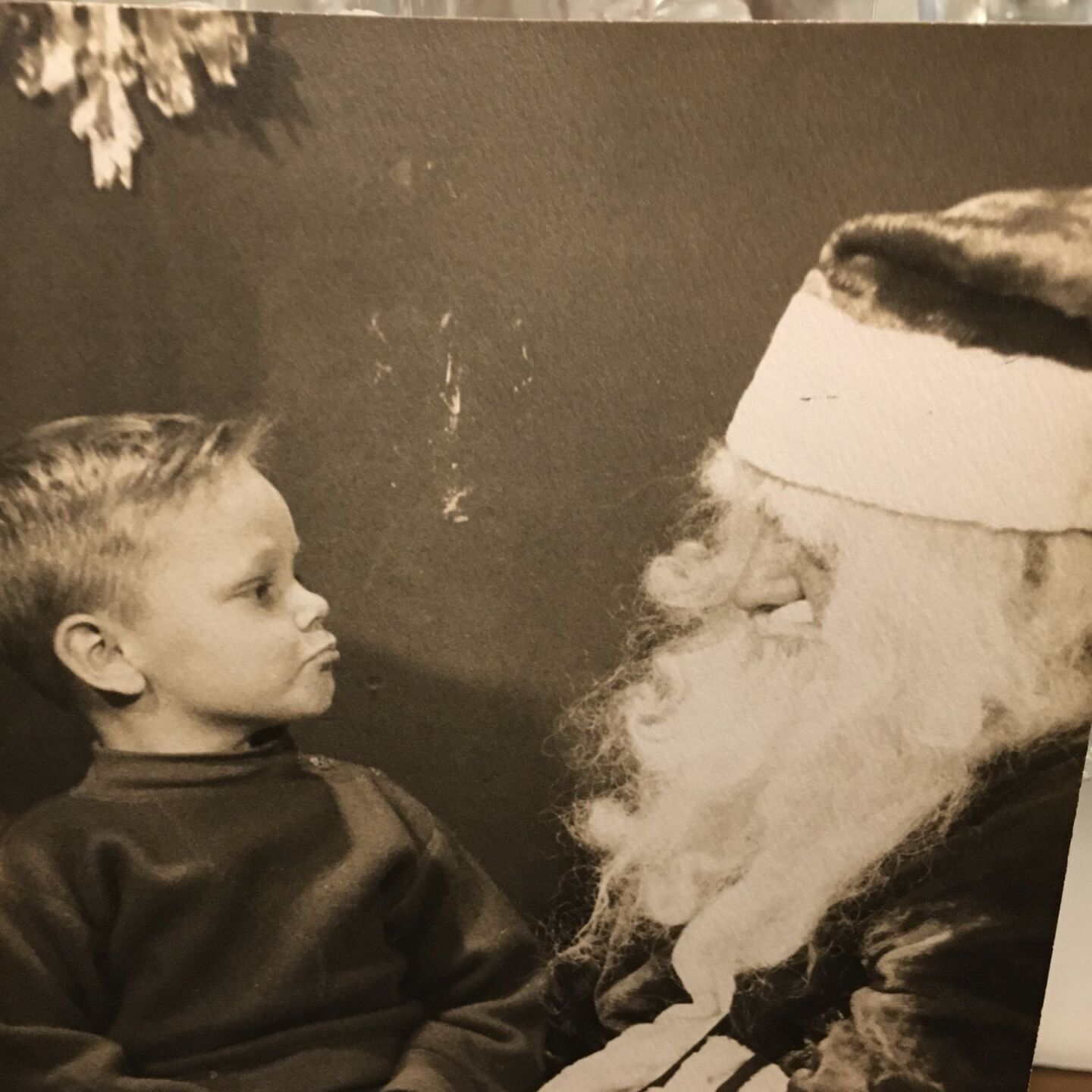 Little Greg staring Santa down